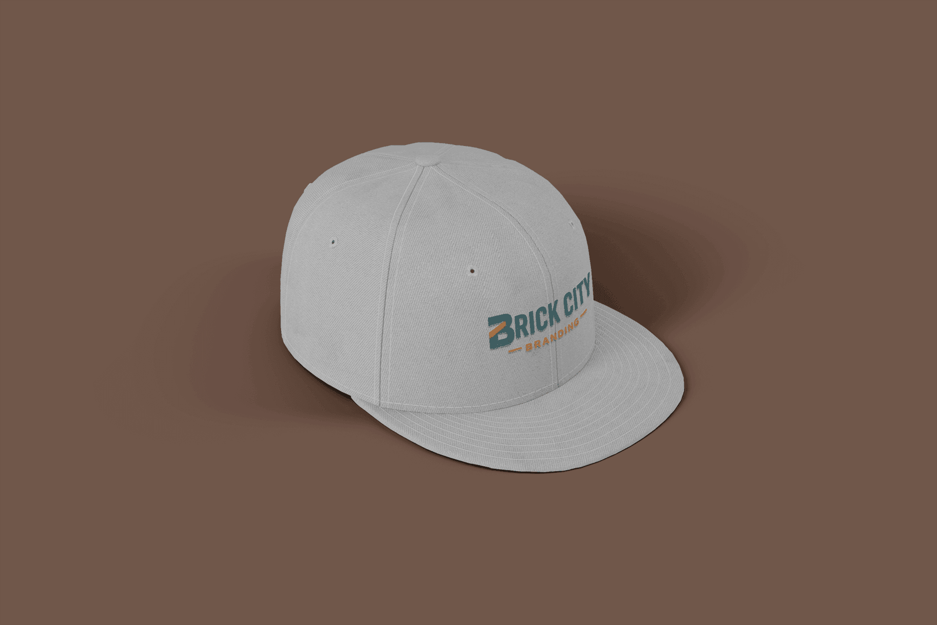 A tan-colored structured baseball cap with the 