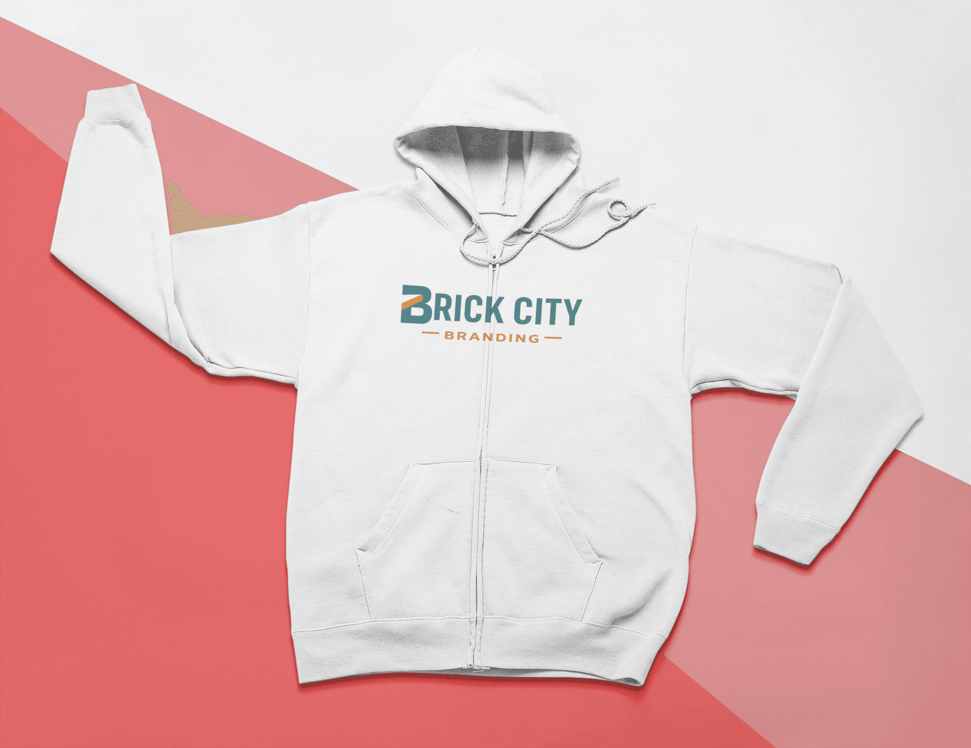 A white hooded zip-up jacket featuring the Brick City Branding logo centered on the chest, displayed on a diagonal white and salmon-pink background.