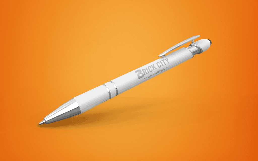 A premium white metal pen with the Brick City Branding logo laser-engraved on the barrel, featuring chrome accents and a black stylus tip against a vibrant orange background.